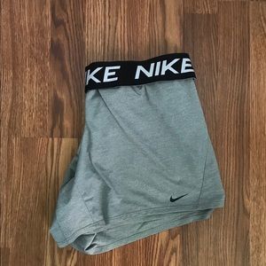 Grey Nike Dry-Fit training shorts